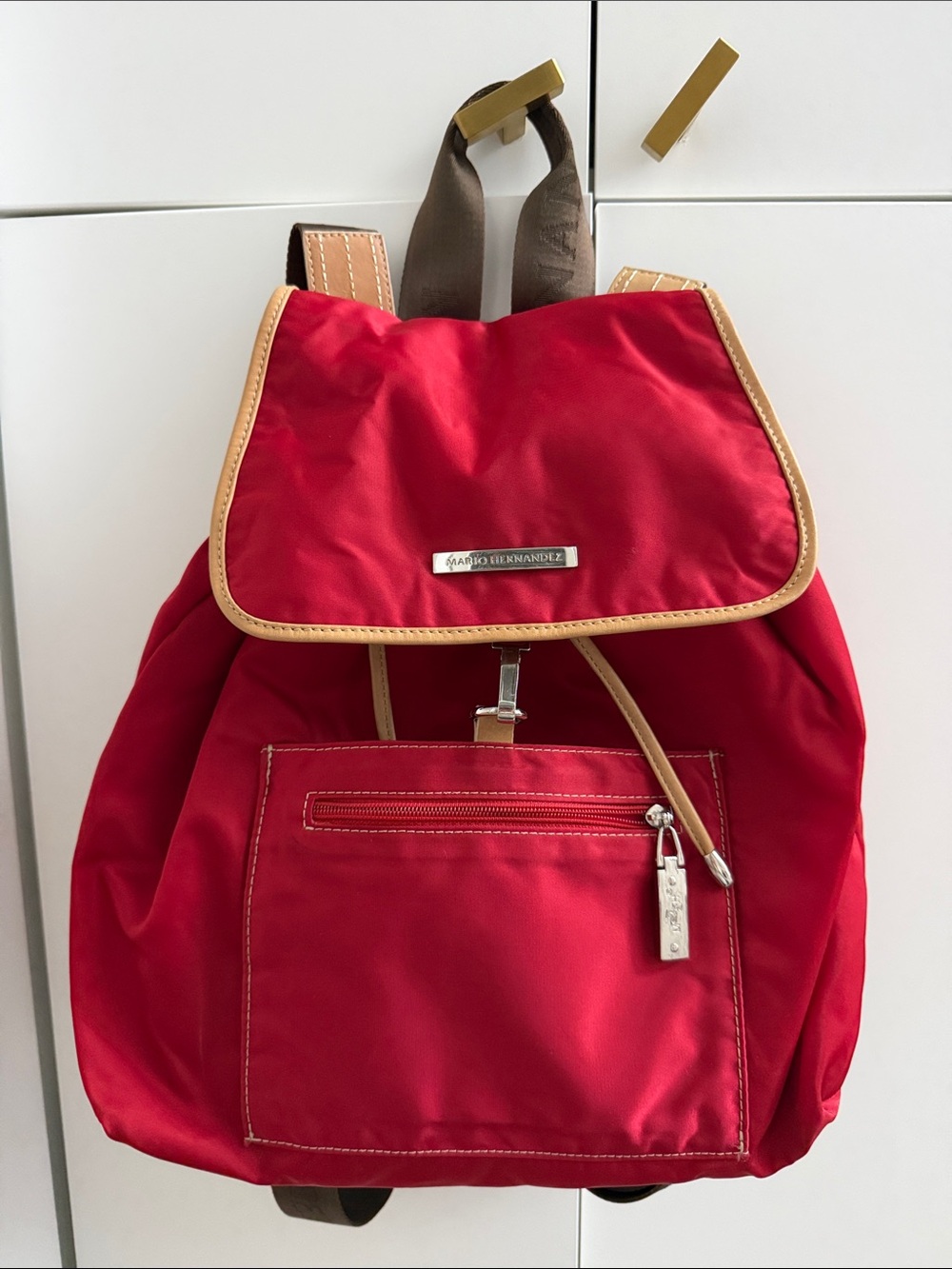 Water-Resistant Red Backpack with Tan Trim